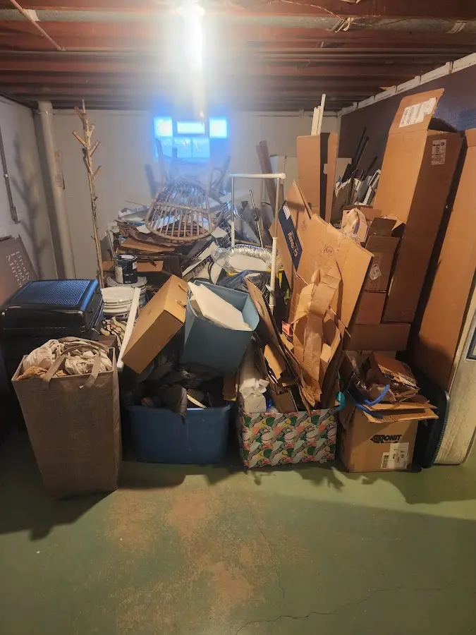 Roll-off dumpster container at job site for Construction Dumpster Rental in Sheridan